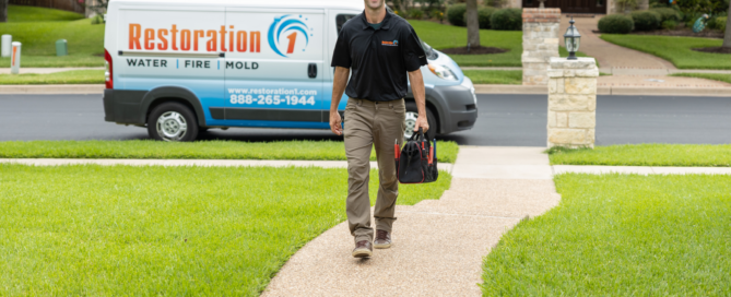 Restoration 1 employee greeting a client