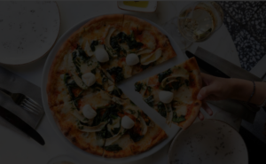 Freshly baked pizza highlighting local SEO growth for multi-location pizza chains.