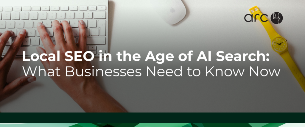 Hands typing on a white keyboard next to a yellow watch and mouse, with a title overlay: "Local SEO in the Age of AI Search: What Businesses Need to Know Now" and the Arc4 logo in the top right corner.