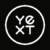 Yext Logo. White with a Dark Background